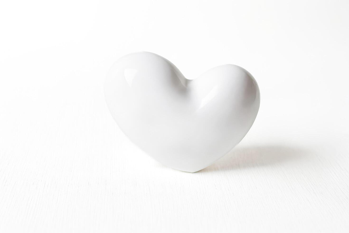 White Heart Shape on White Background photo