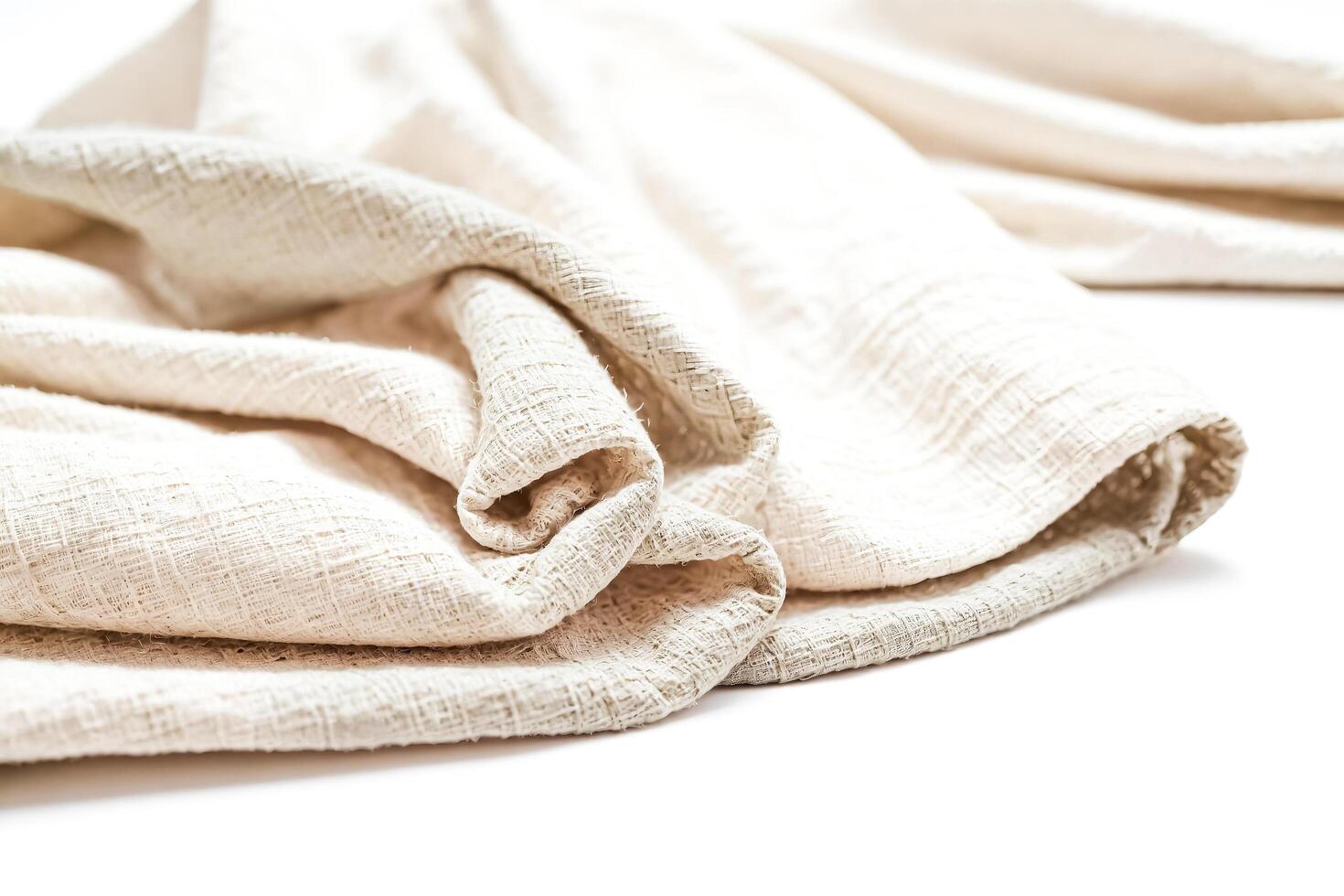Soft White Fabric Draped on White Background photo