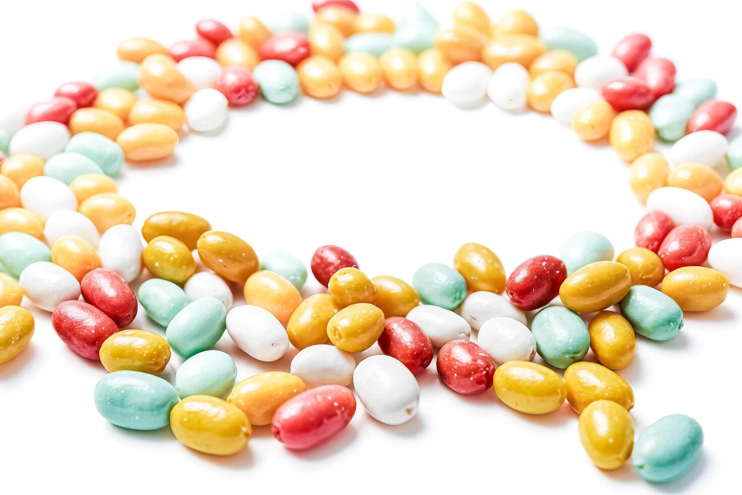 Colorful Candy Eggs on White Background photo