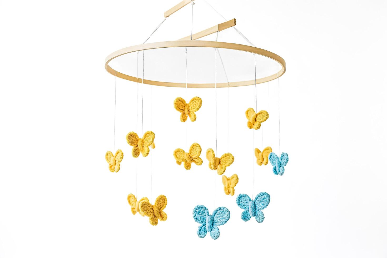 Wooden Baby Mobile with Yellow and Blue Butterflies photo