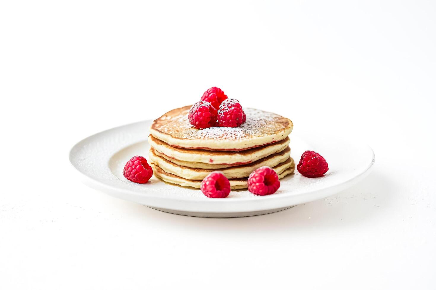 Stack of Pancakes with Raspberries and Powdered Sugar photo