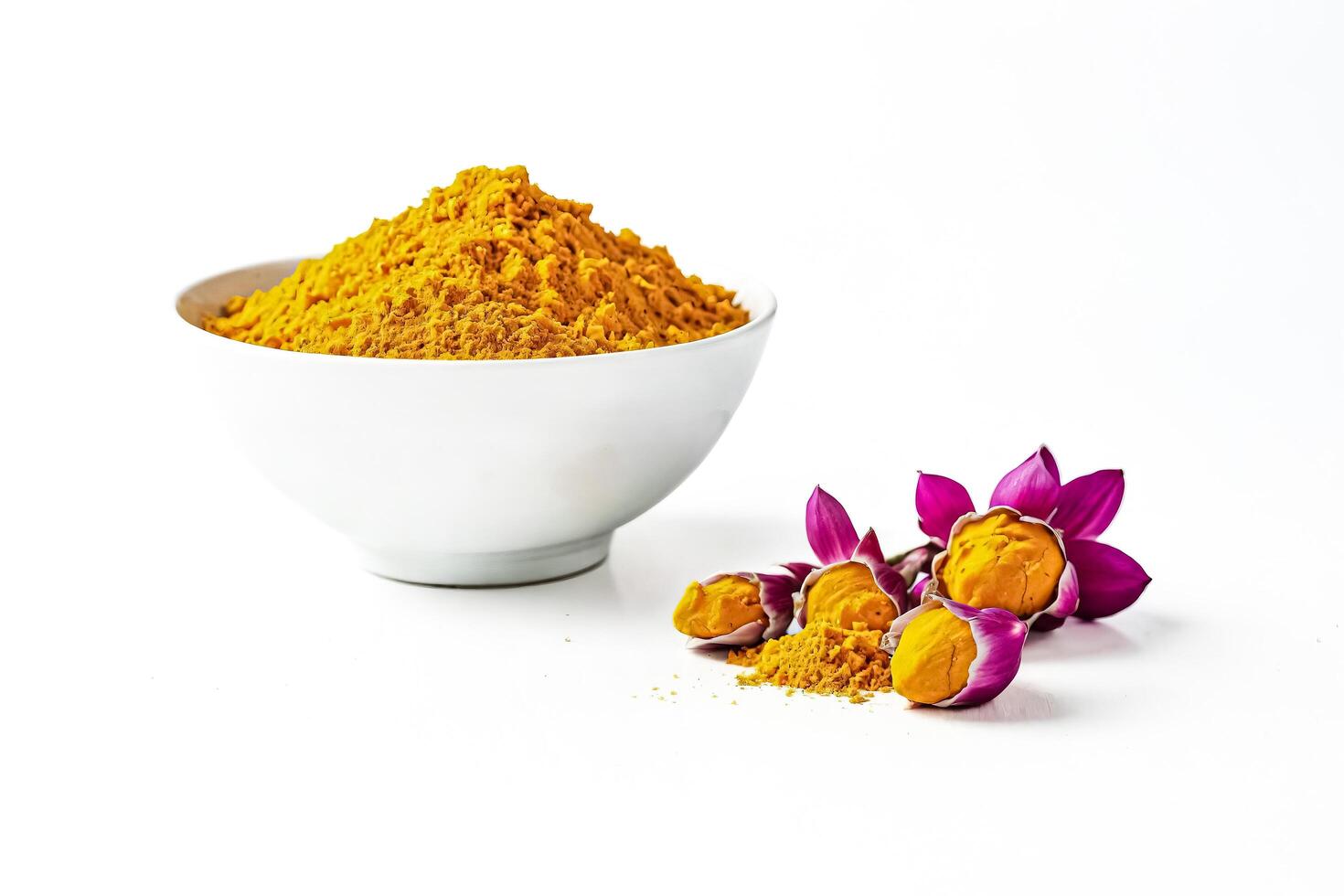 Turmeric Powder and Flowers on White Background photo