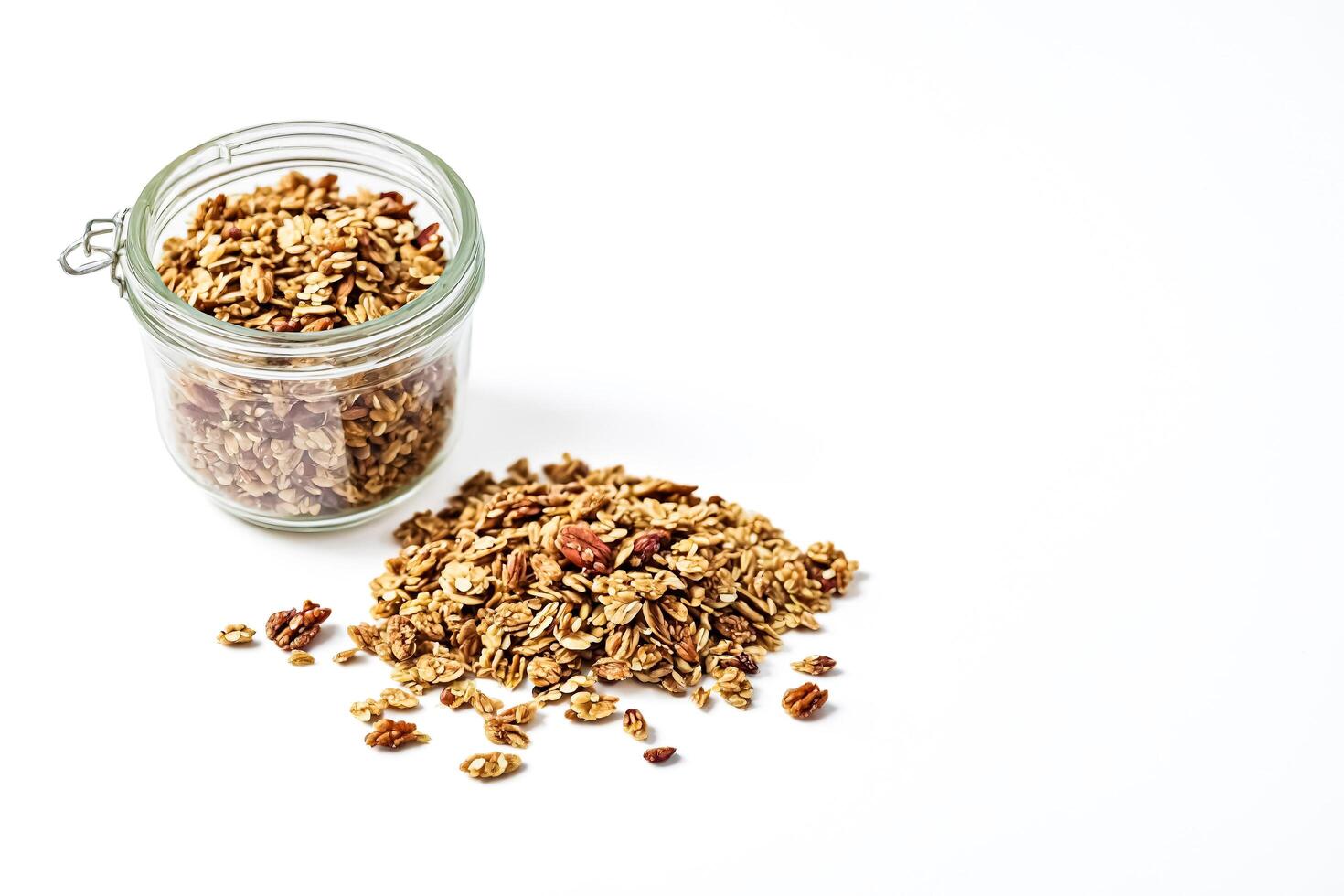 Granola with nuts in a glass jar photo