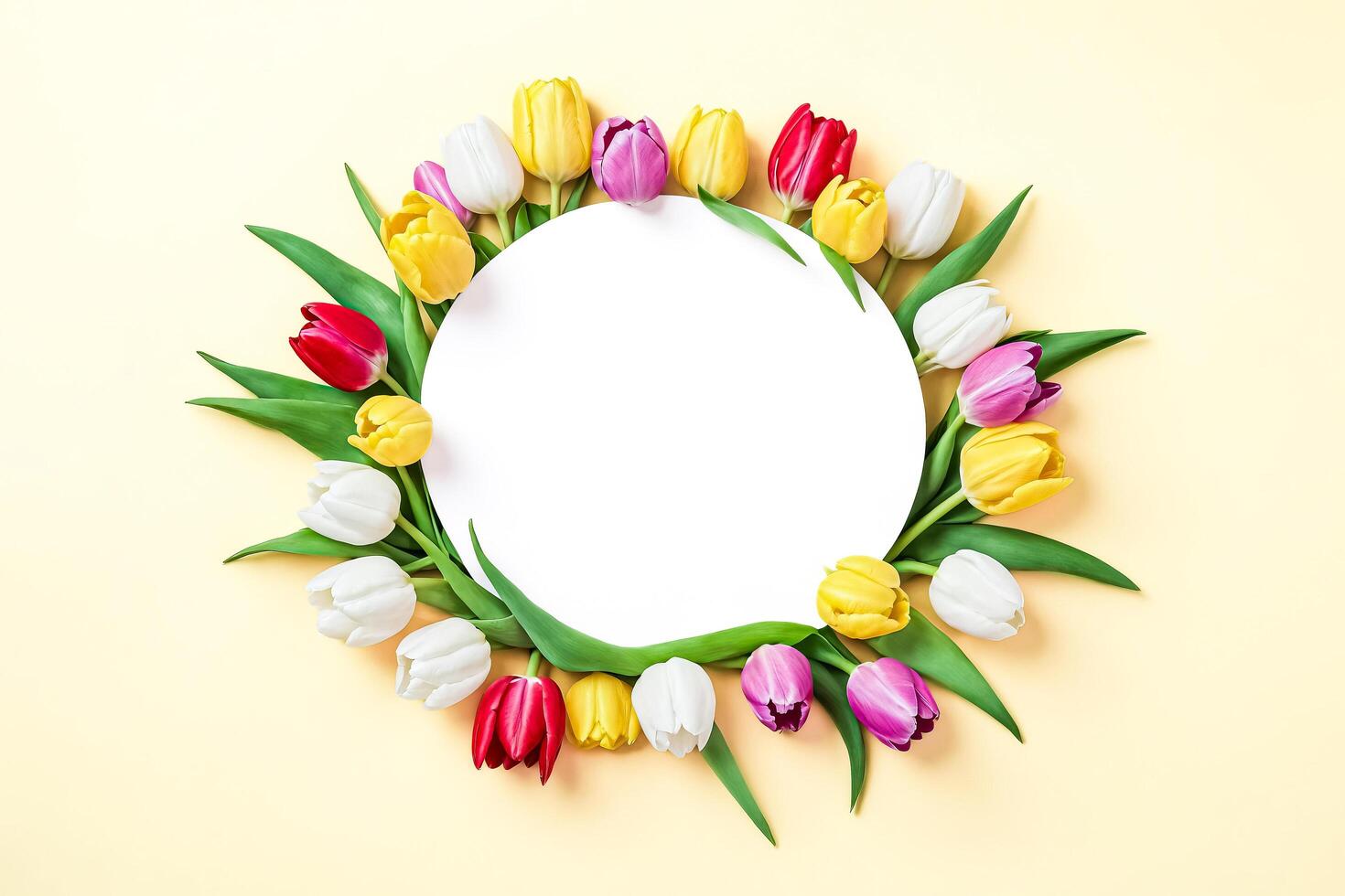Colorful Tulips Frame a Blank Circle on Yellow Background photo