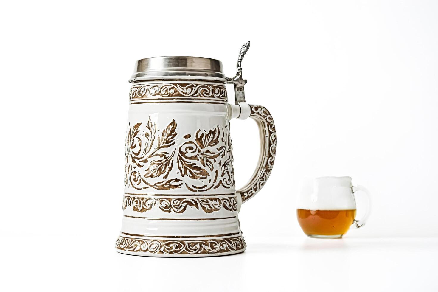Ornate Beer Stein and Glass on White Background photo