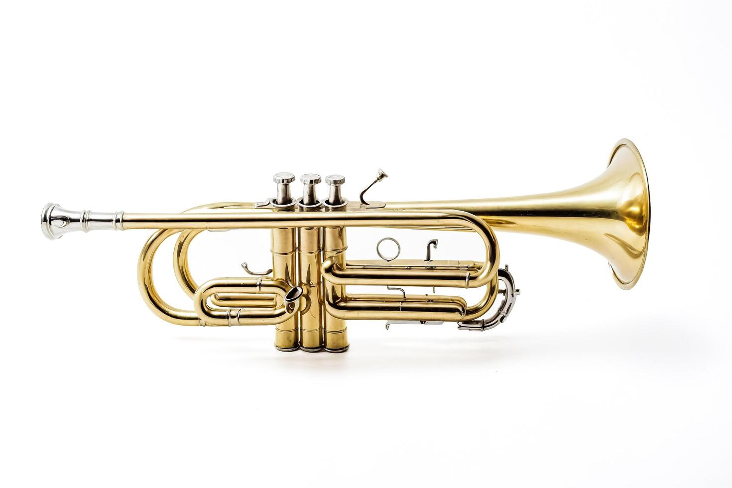 Golden trumpet on white background photo