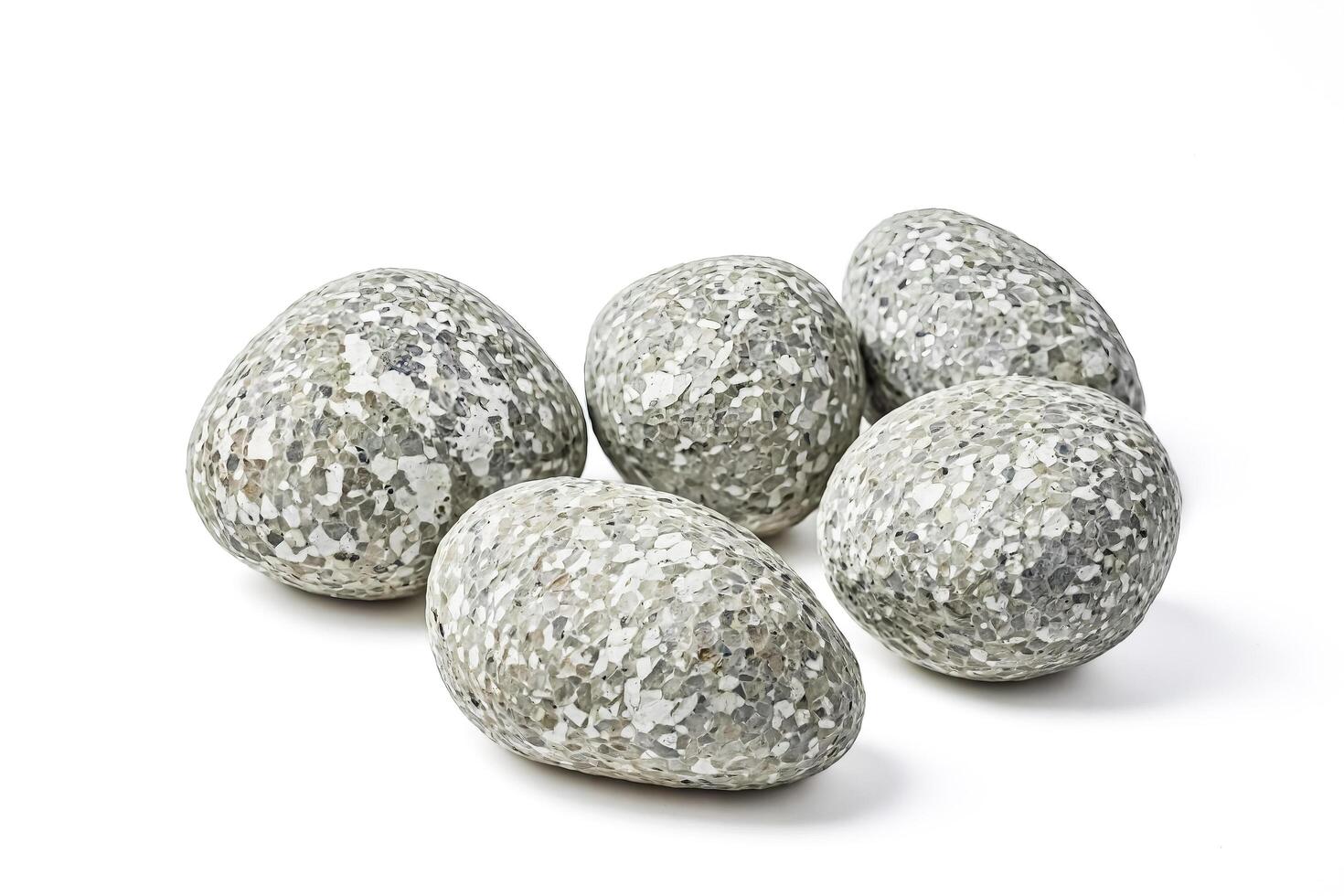 Close-up of Gray Pebbles on White Background photo
