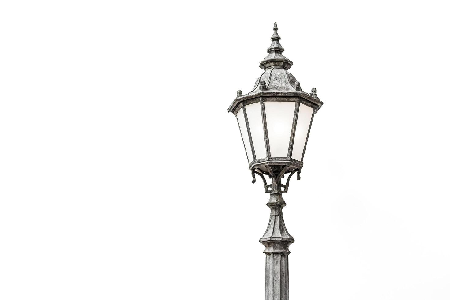Vintage street lamp post with white background photo