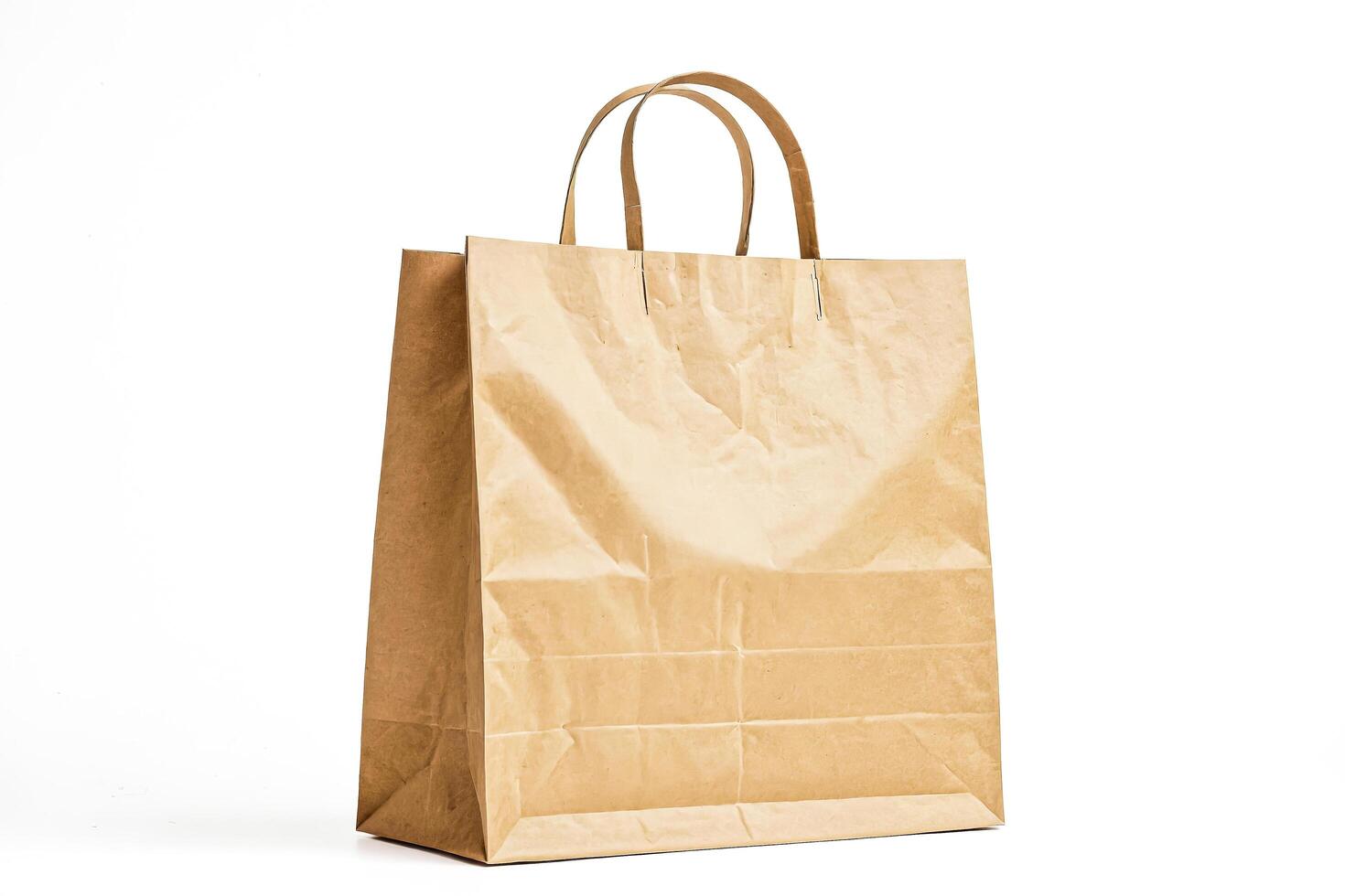 Brown Paper Bag on White Background photo