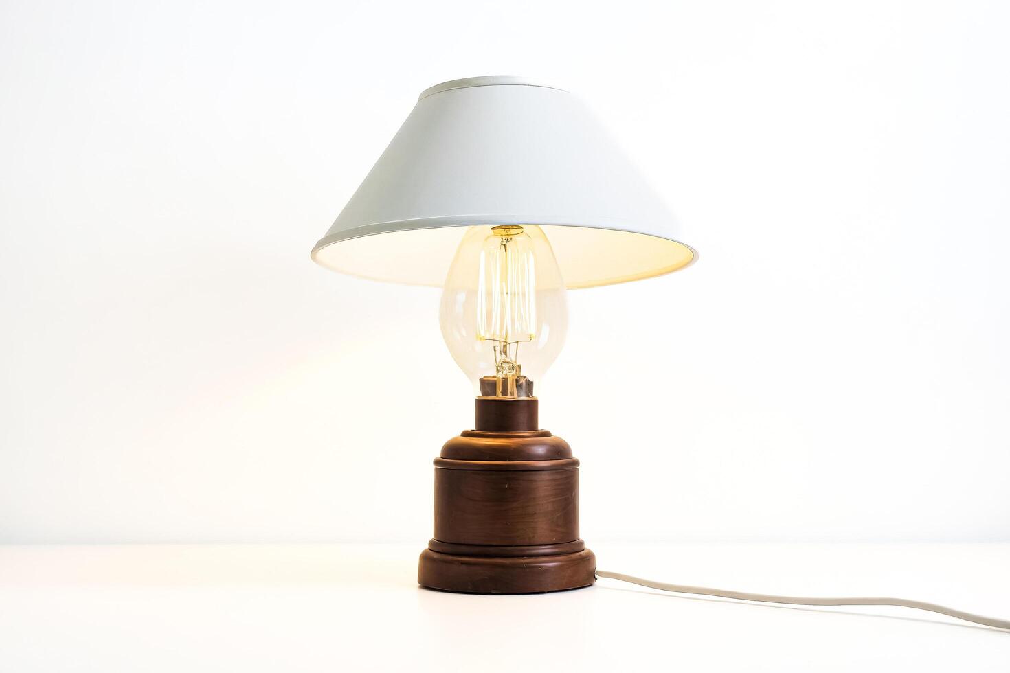 Table Lamp with Edison Bulb and White Lampshade photo