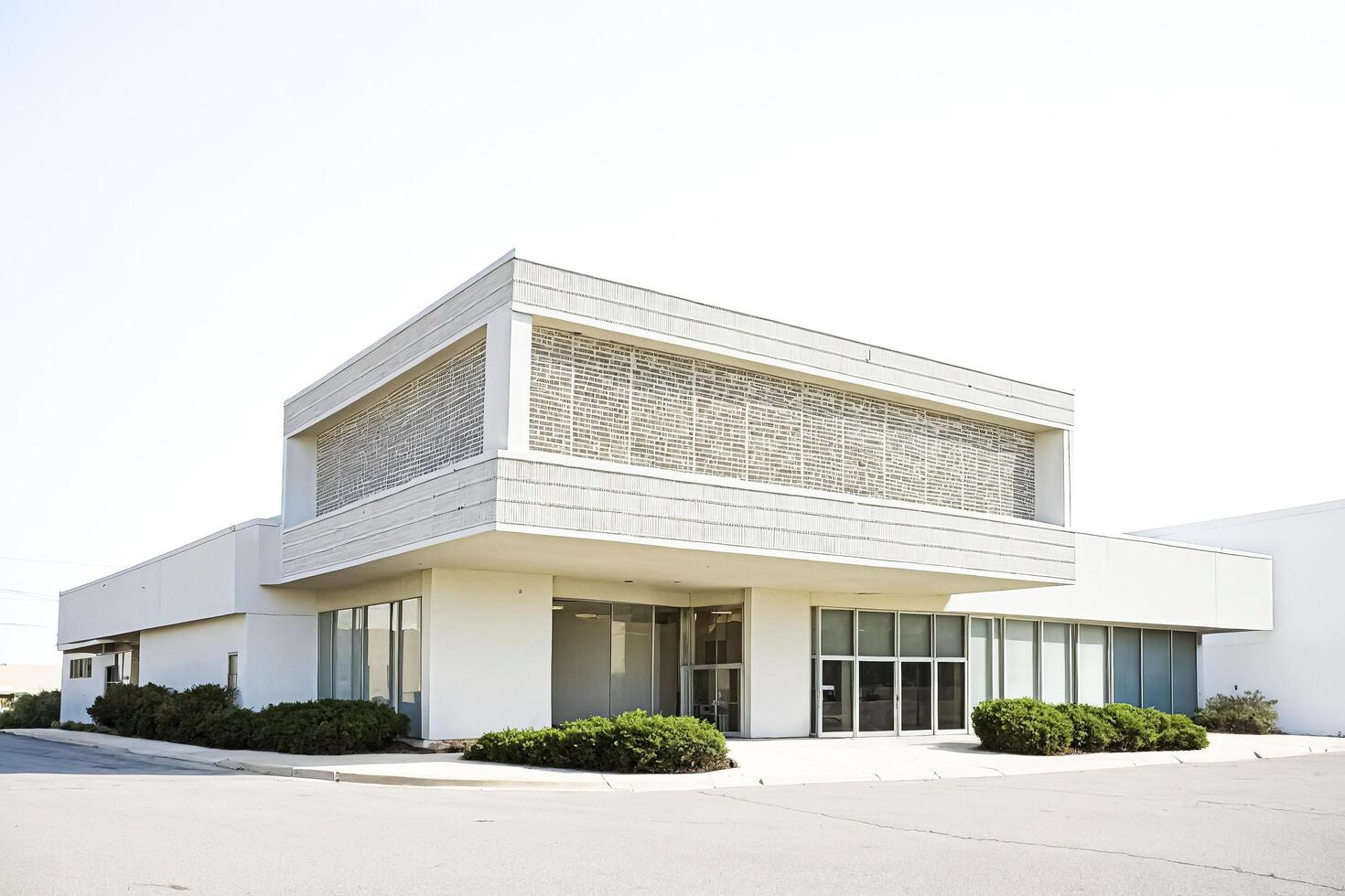 Modern Office Building with White Facade and Glass Windows photo