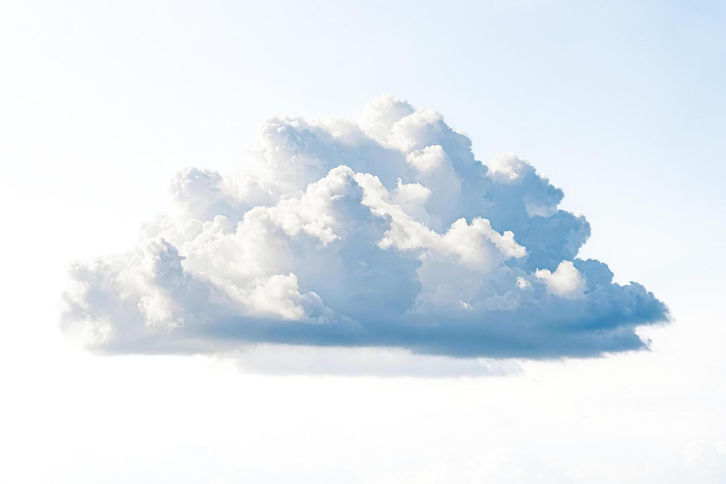 Fluffy White Cloud Isolated on a Blue Sky Background photo