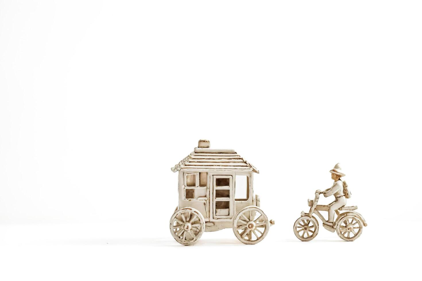 White Carriage and Bicycle Toy on White Background photo