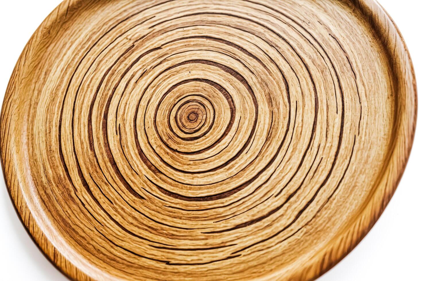 Closeup of a Wooden Plate with Circular Grain photo