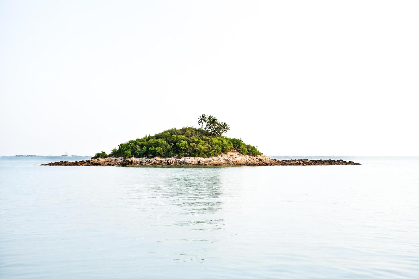 Small island in the sea photo