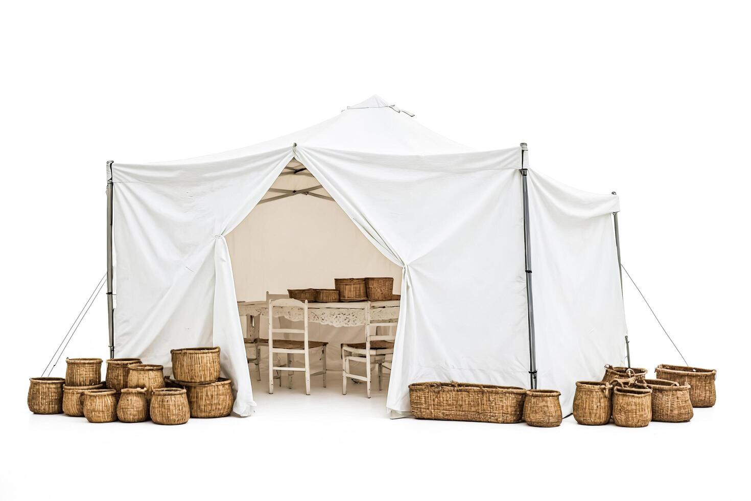 White Tent with Wicker Baskets and a Table photo