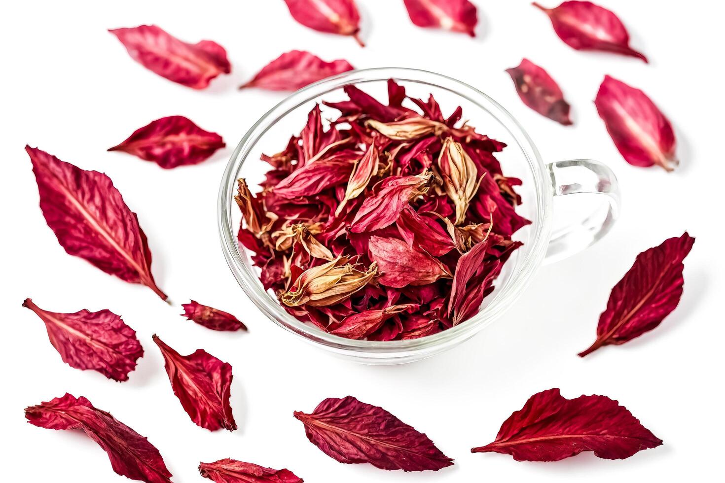 Dried red hibiscus flower petals in a glass bowl photo