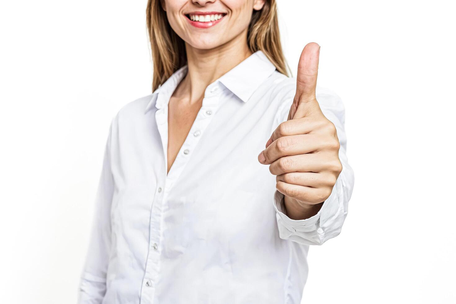 Smiling woman giving thumbs up photo
