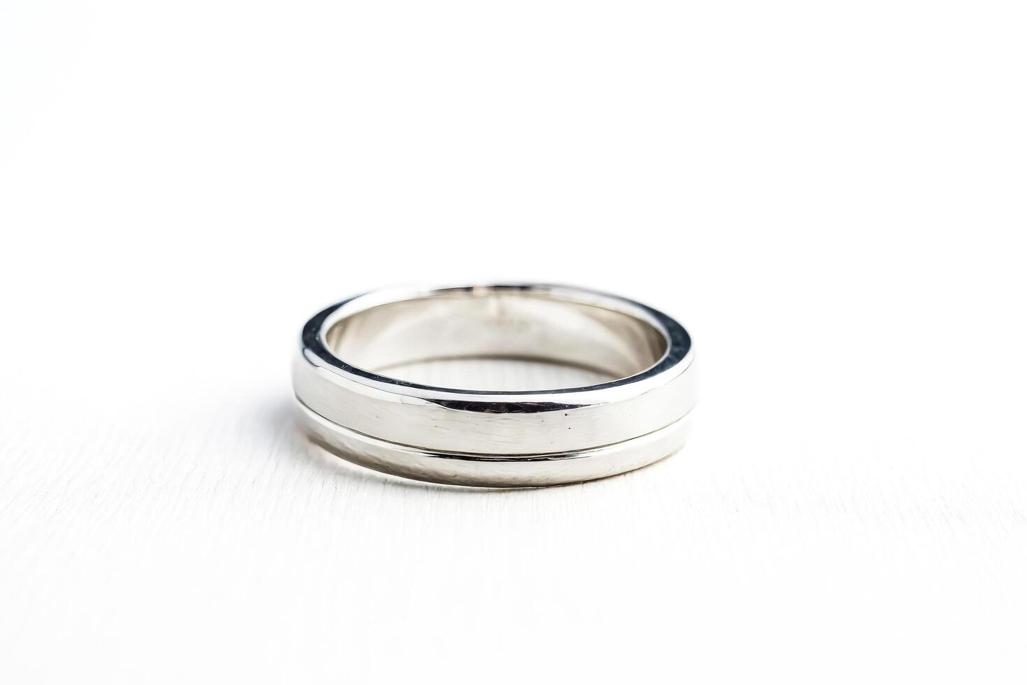 Silver Wedding Band on White Background photo