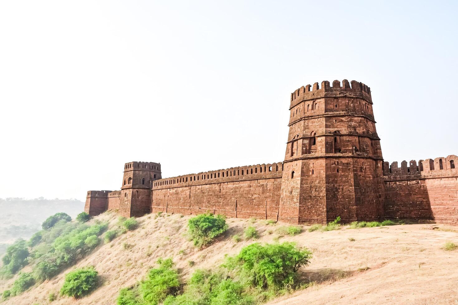 Ancient Fort Wall and Tower Against a Clear Sky photo
