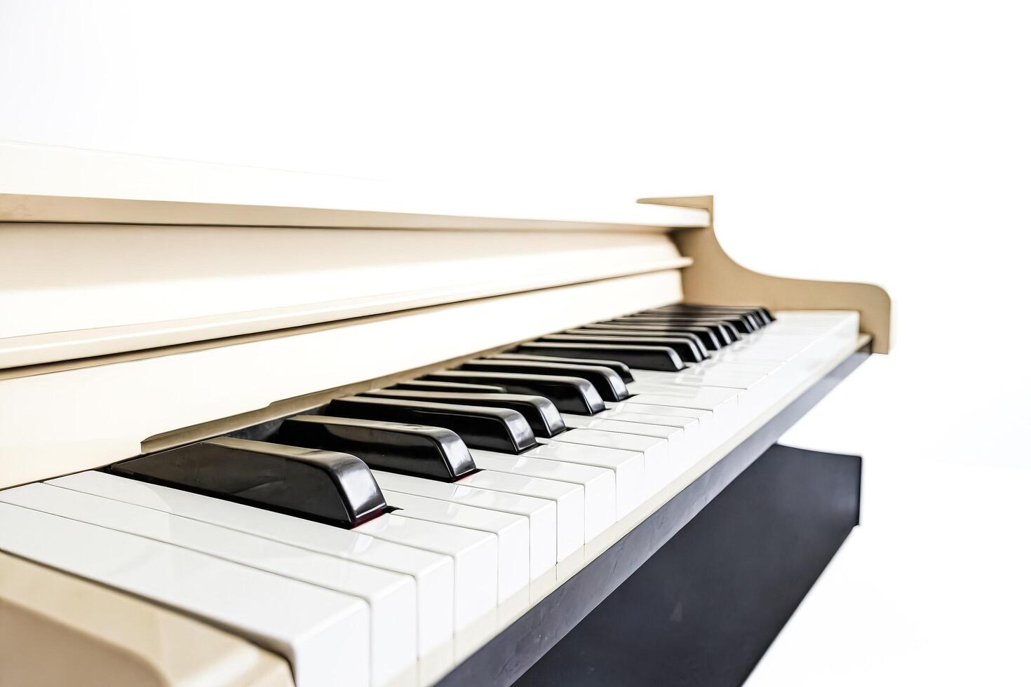 Close-up of a White Piano Keyboard photo