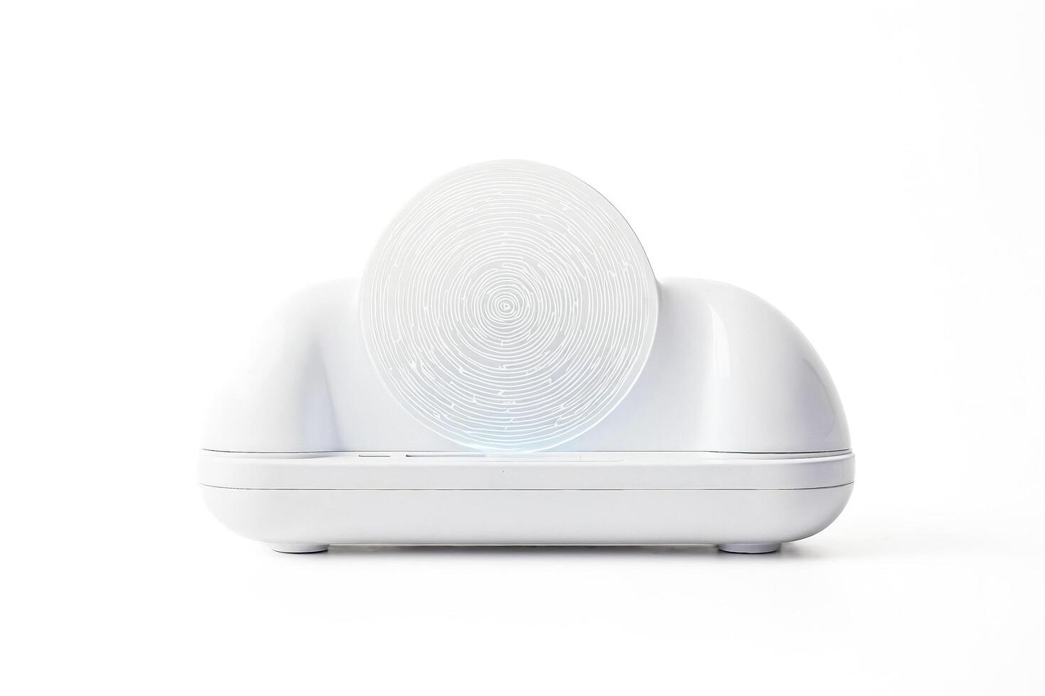 White Circular Device with Detailed Pattern photo