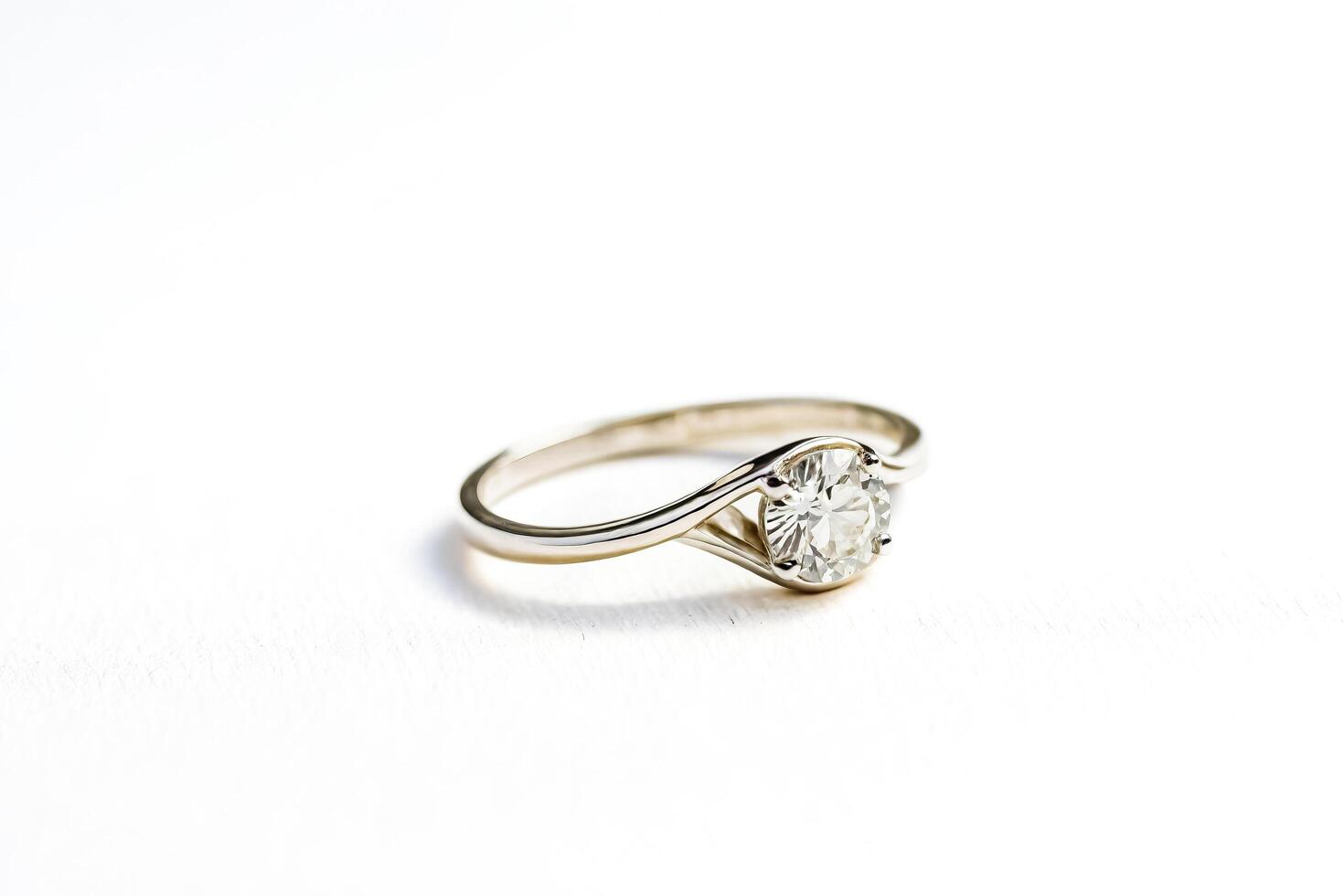 Diamond ring on white background photo