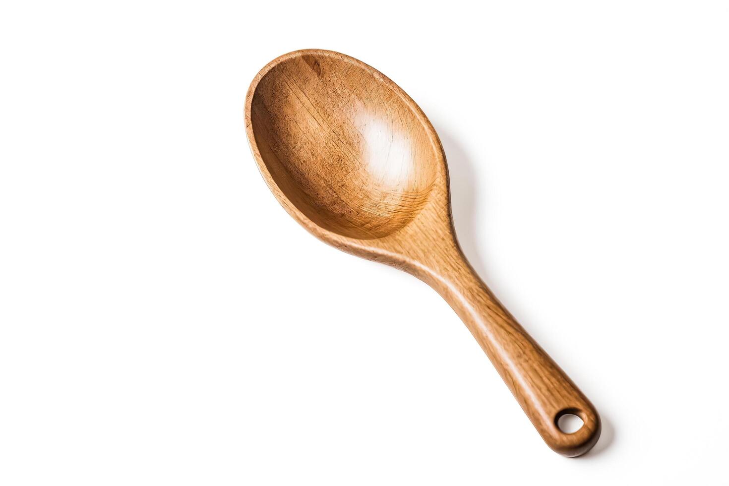 Wooden Ladle on White Background photo