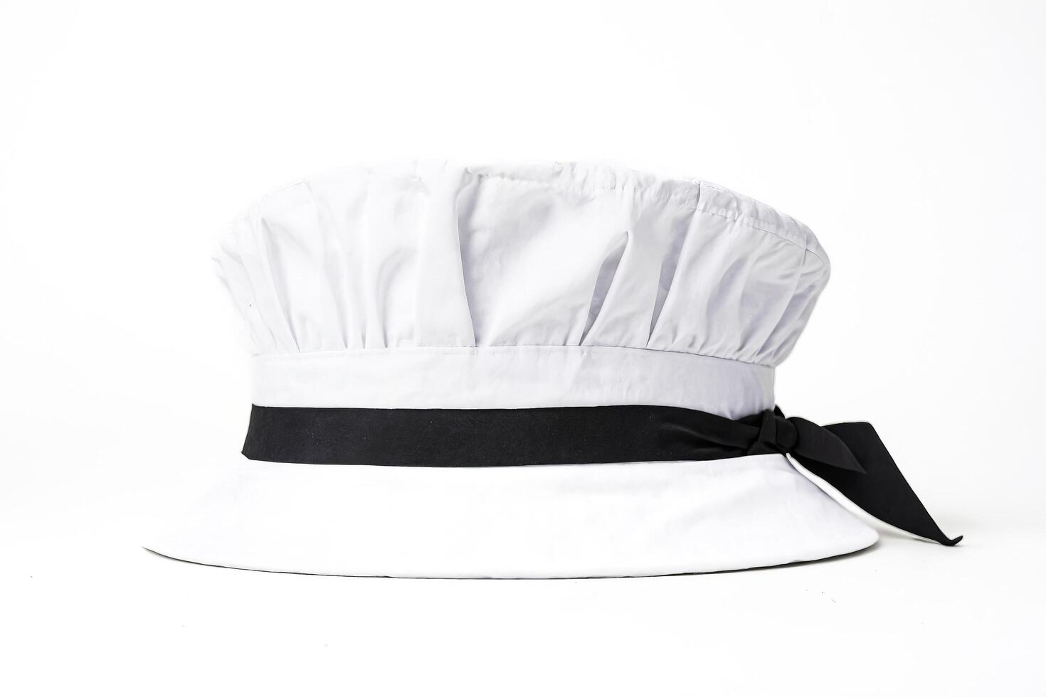 White chef hat with black ribbon photo