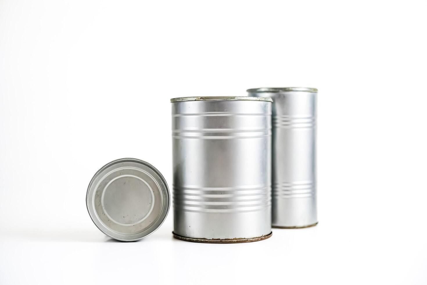 Three Silver Cans Isolated on White Background photo