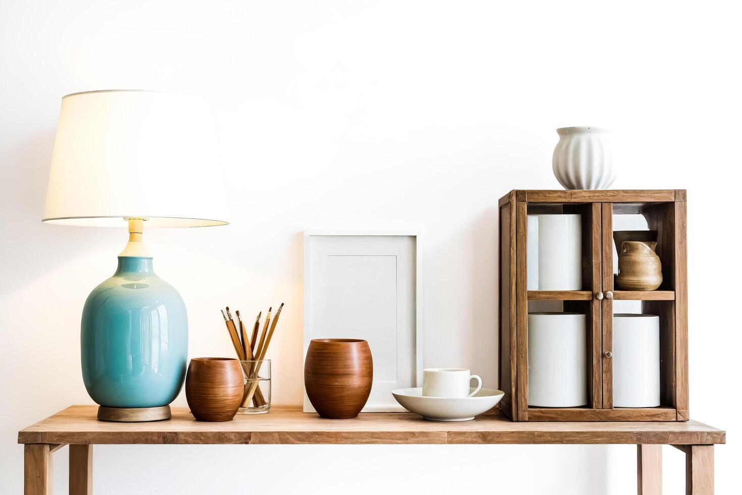 Modern Minimalist Interior Design with Wooden Shelf and White Wall photo