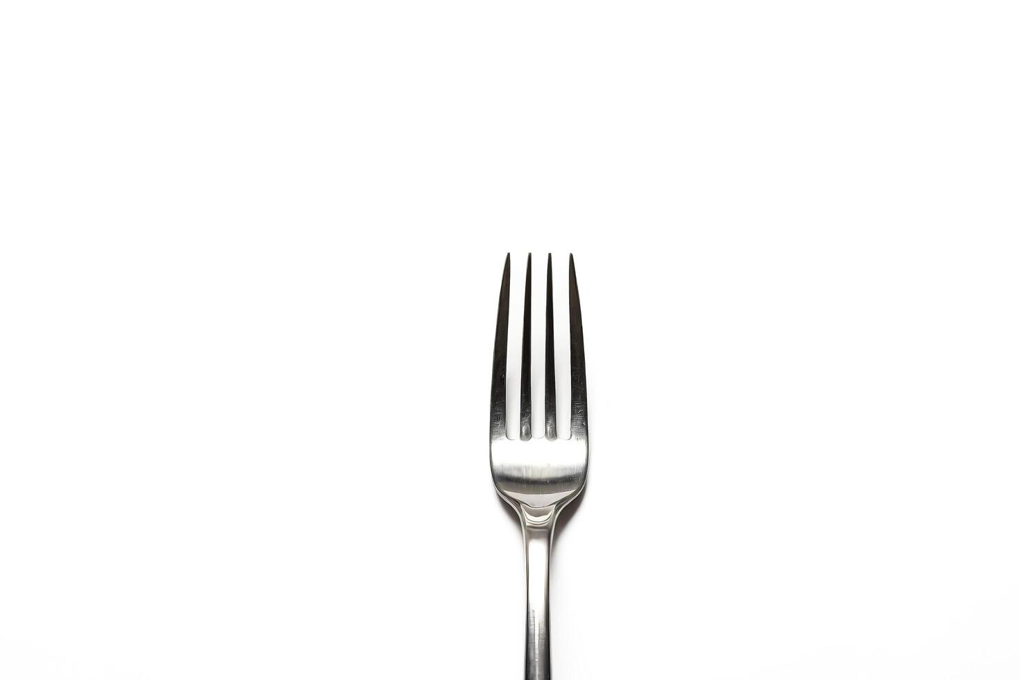 Silver Fork on a White Background photo