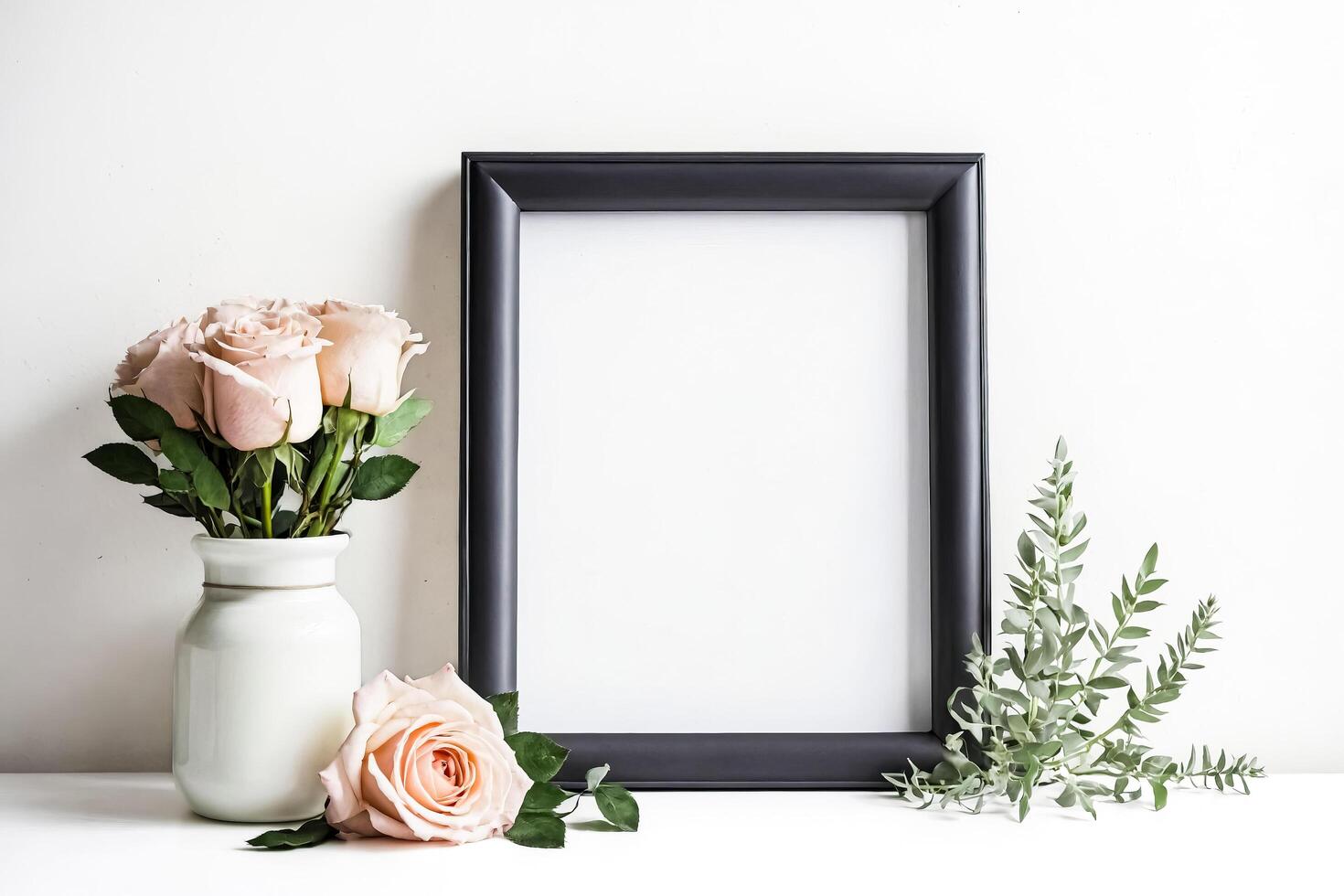 Blank Frame Mockup with Rose Flowers and Greenery photo