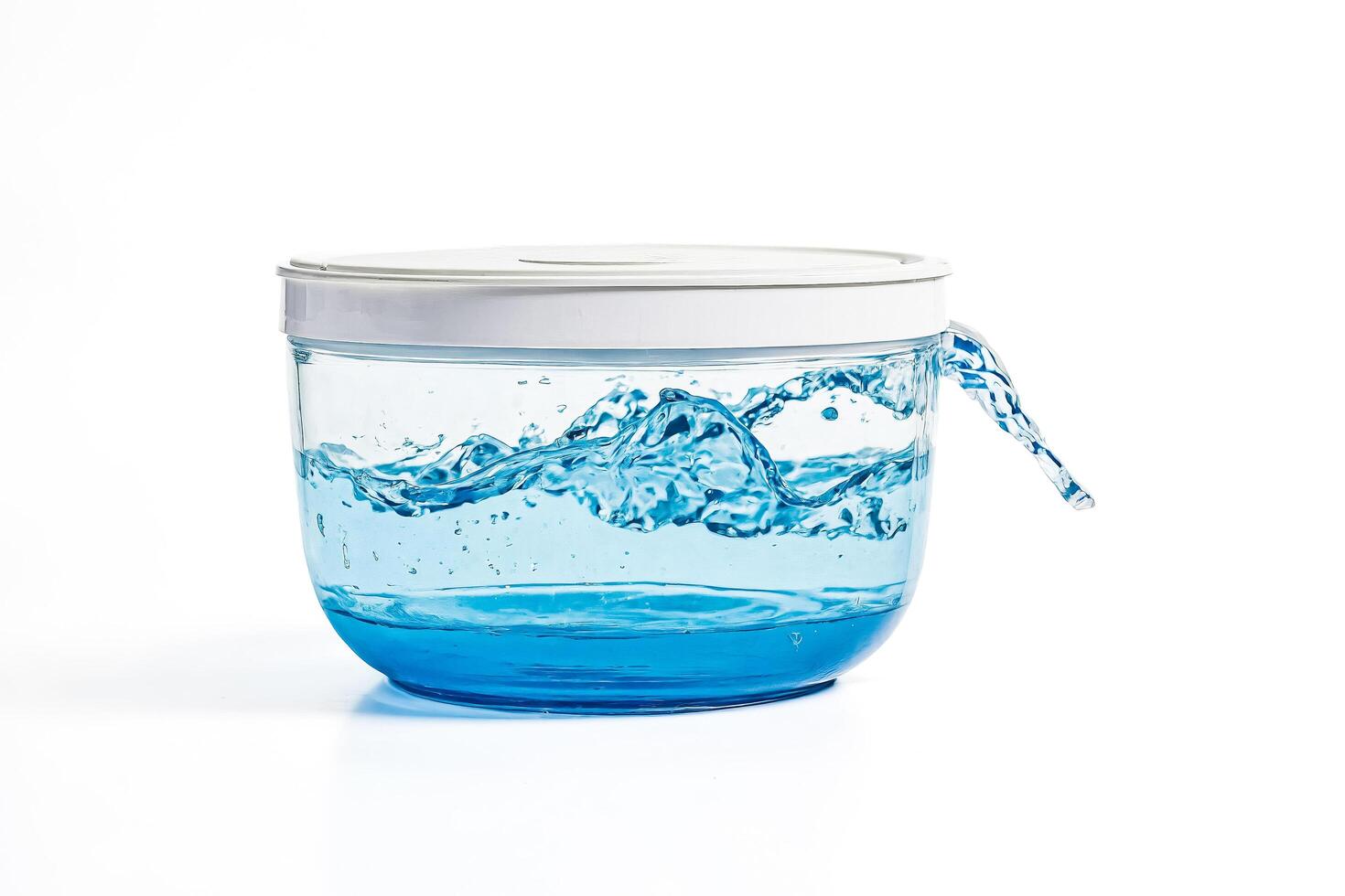 Blue Glass Container With Water Splash photo