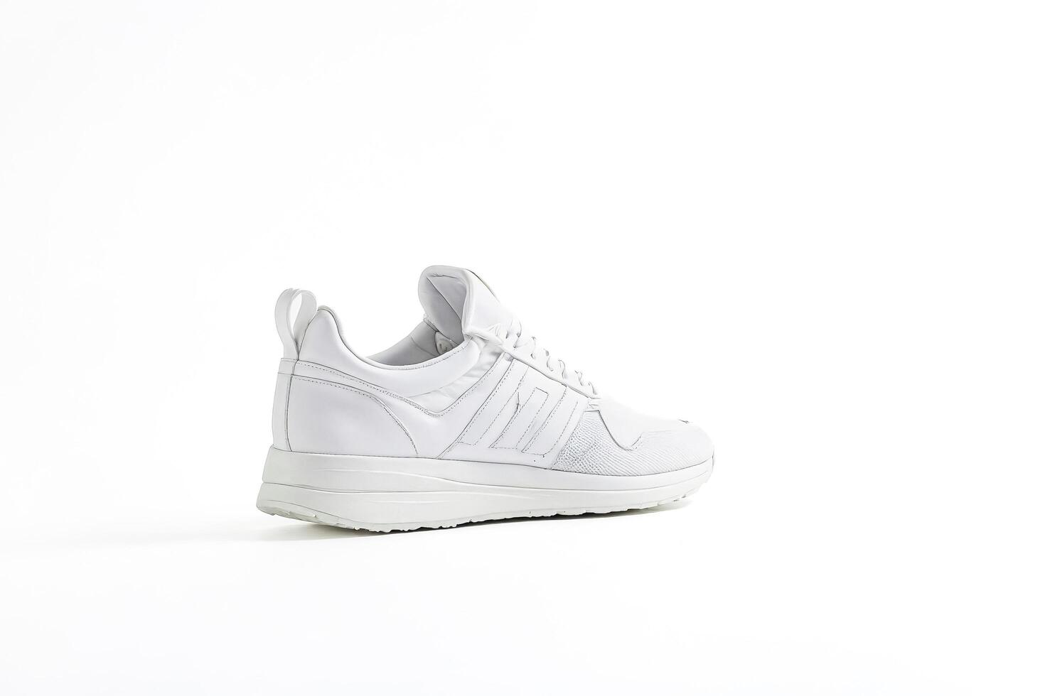 White Sneaker on a White Background photo