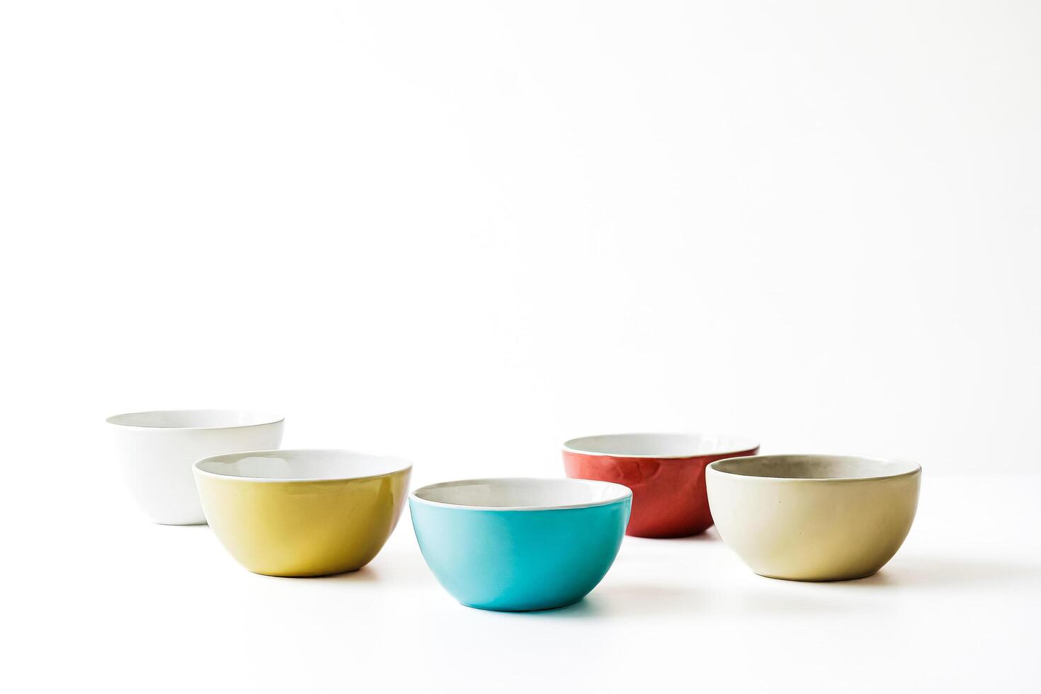Colorful Bowls on White Background photo