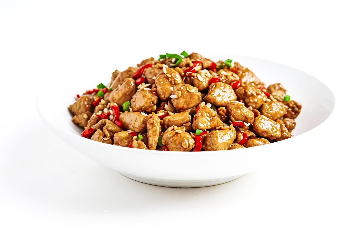 Close up of chicken with chili peppers in a white bowl photo