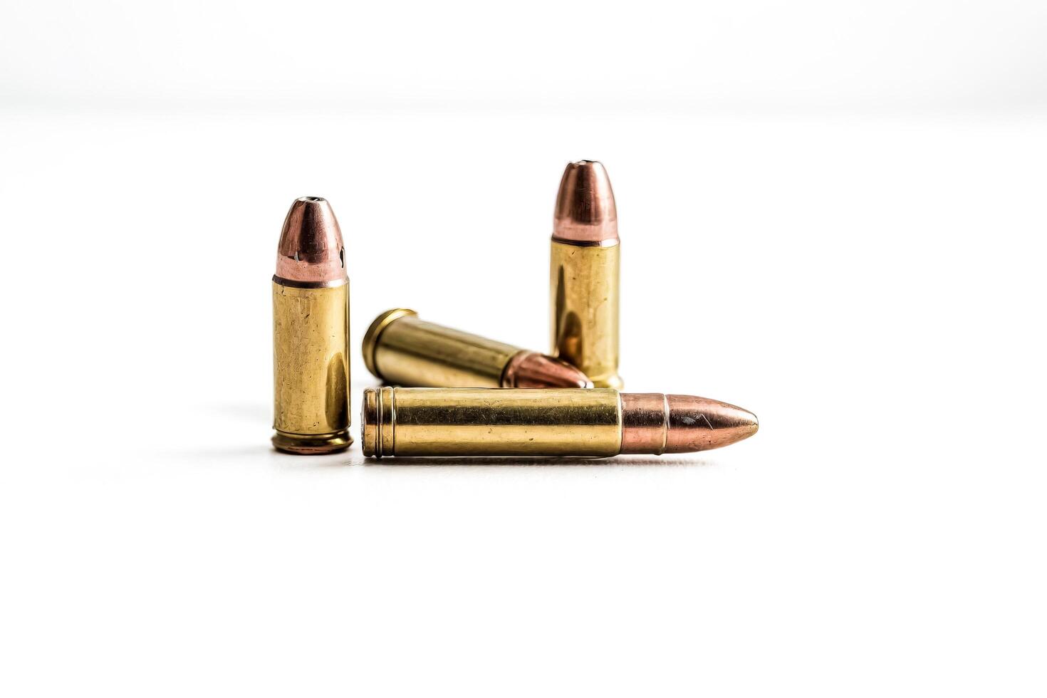 Three Bullets on a White Background photo