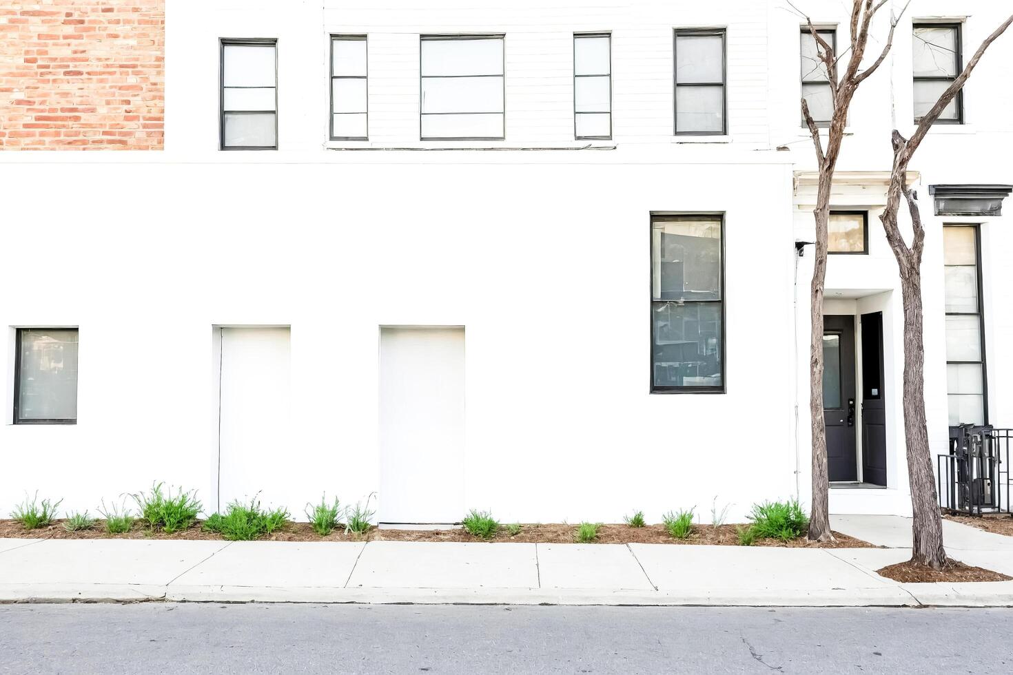 White Building with Black Windows and Doors photo