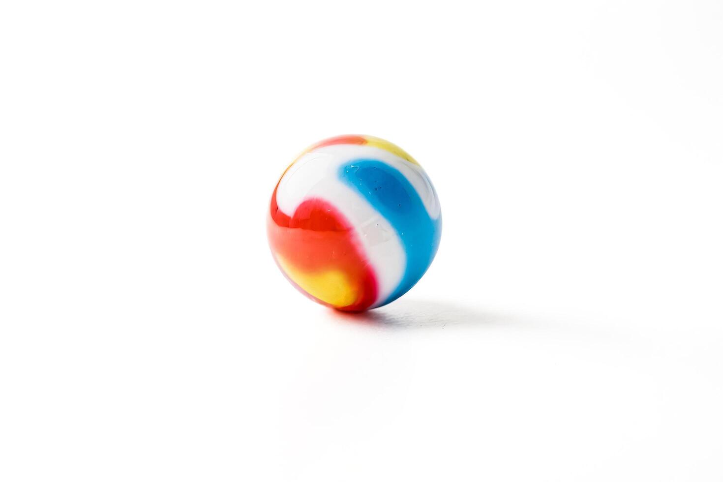 Colorful Glass Marble on White Background photo