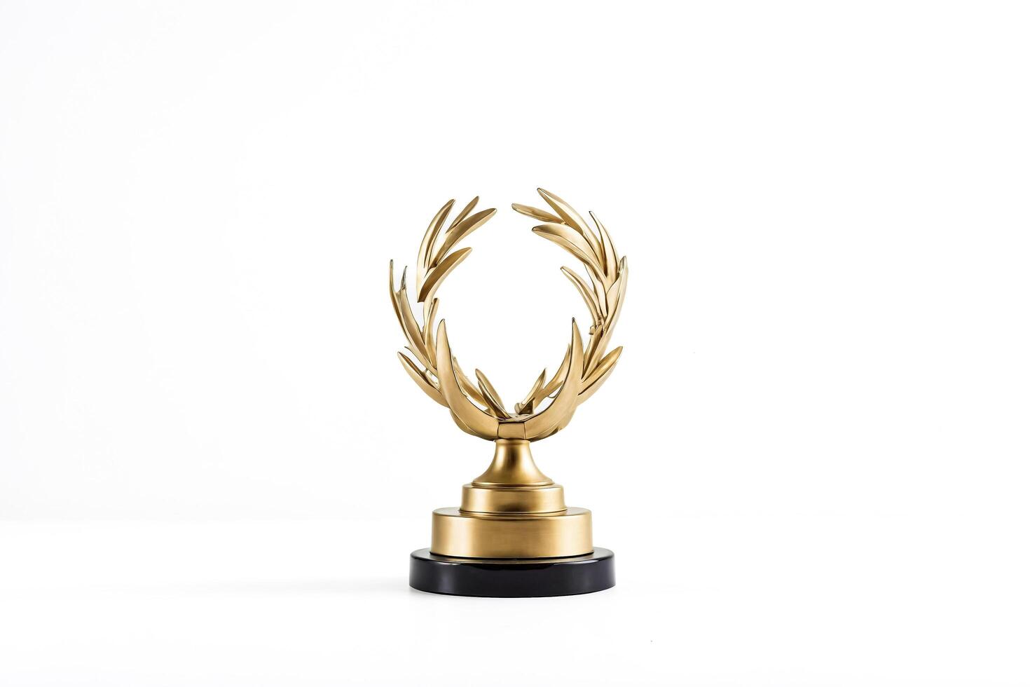 Golden laurel wreath trophy on white background photo