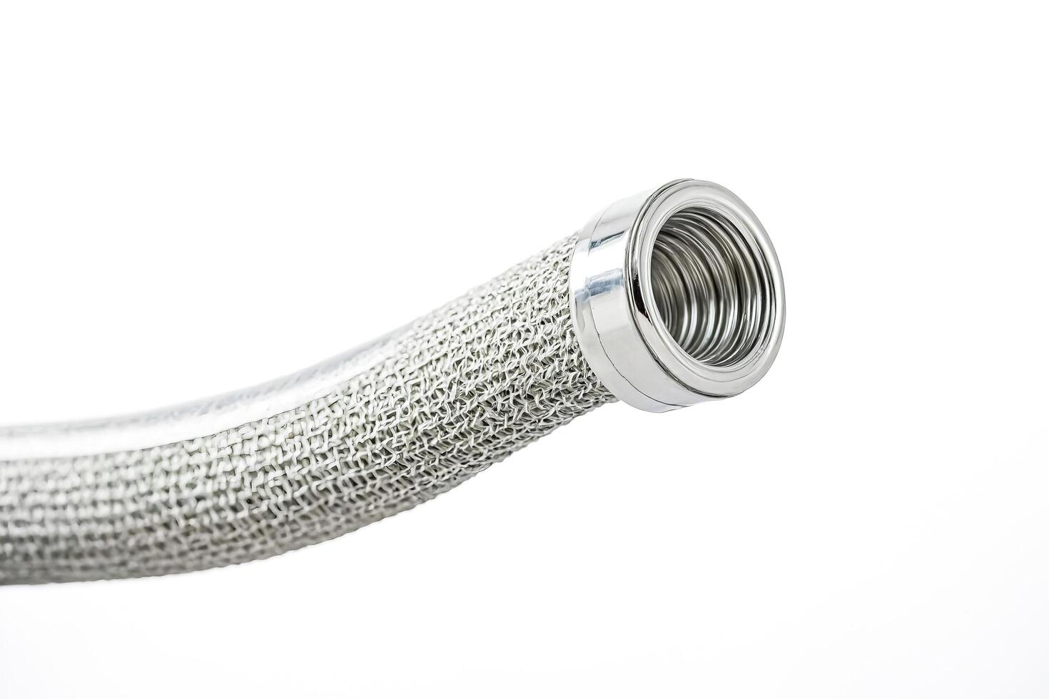 Close-up of a Metallic Mesh Tube with a Shiny End photo