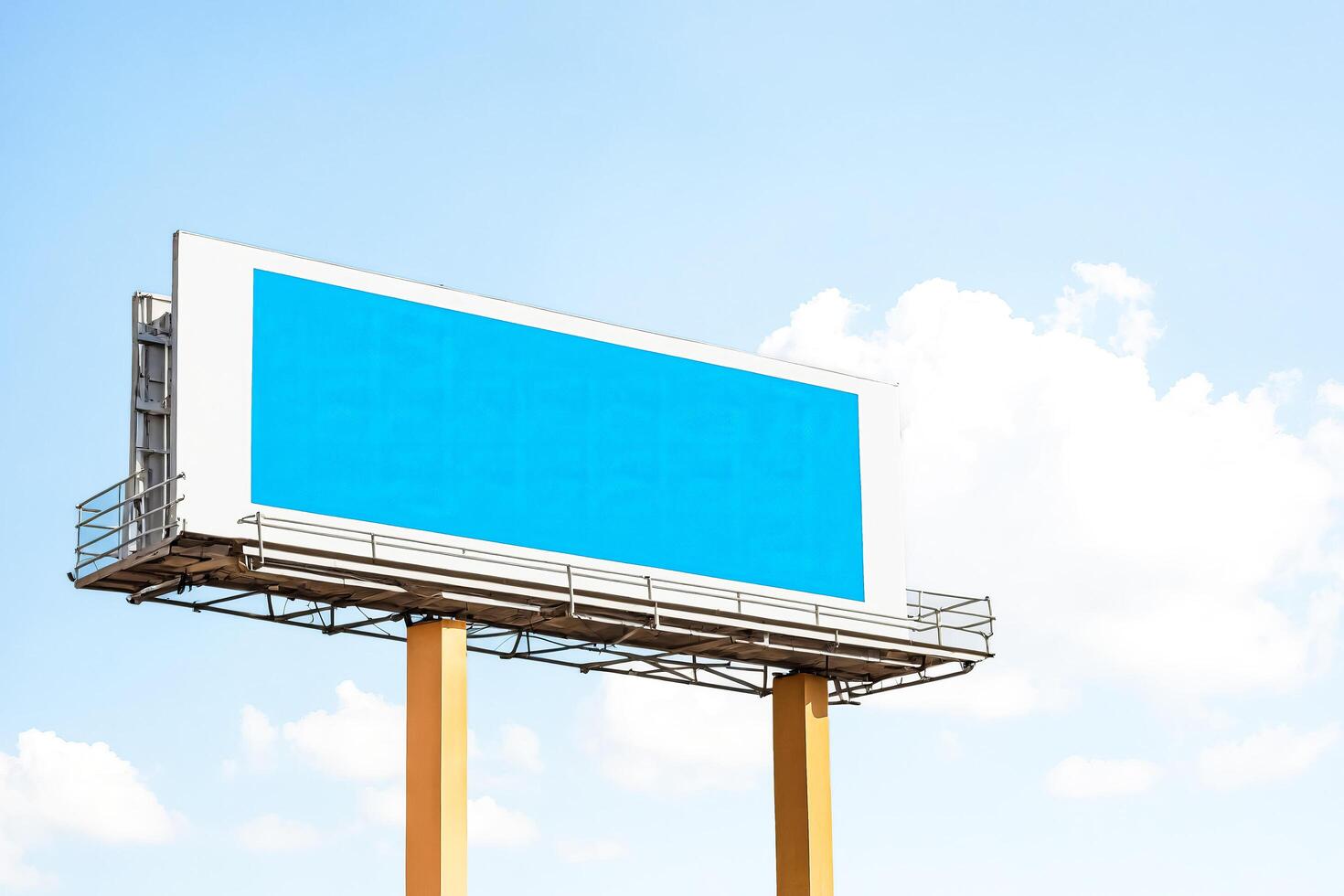Blank Billboard with Blue Sky and Clouds photo