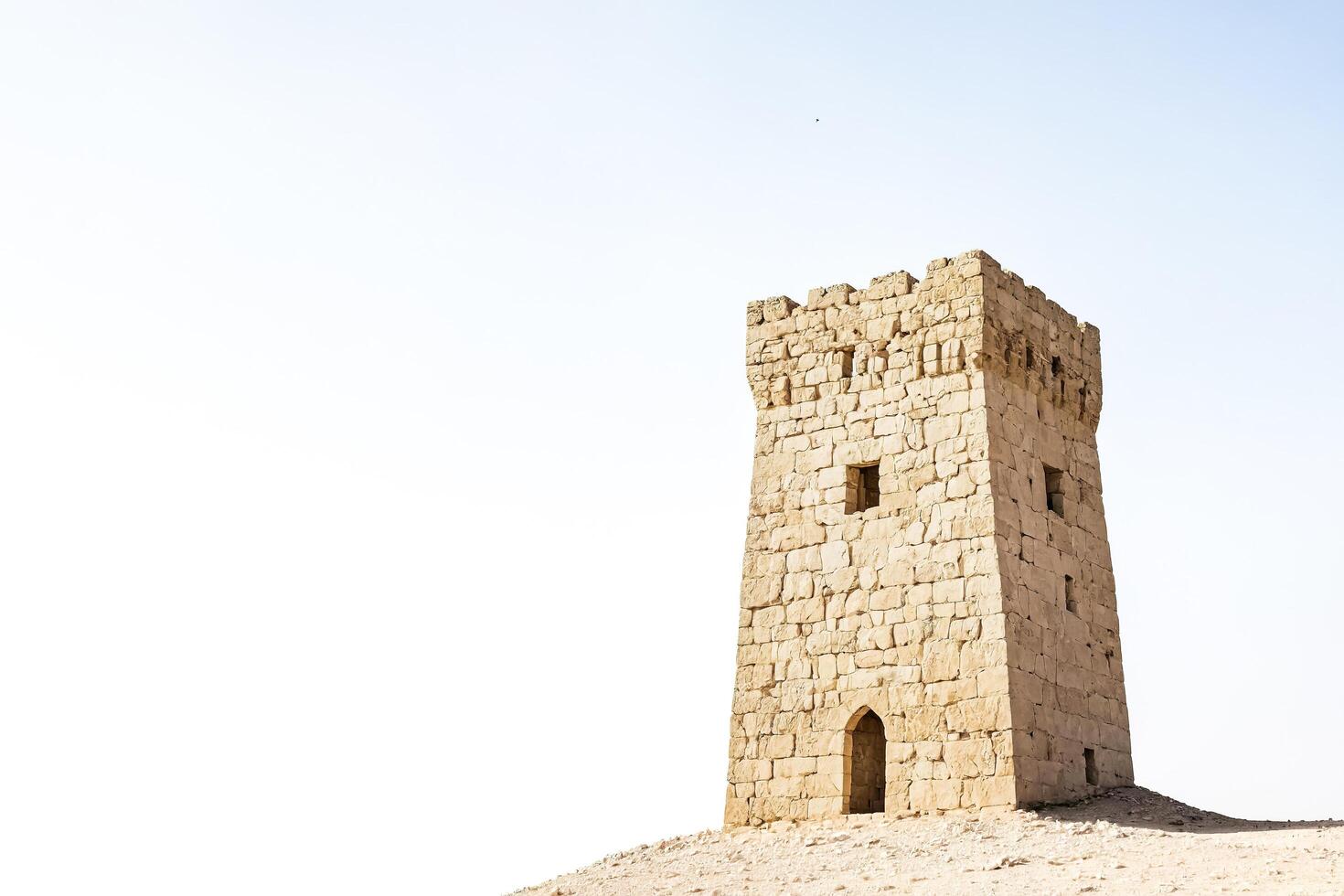 Ancient Stone Tower in the Desert photo