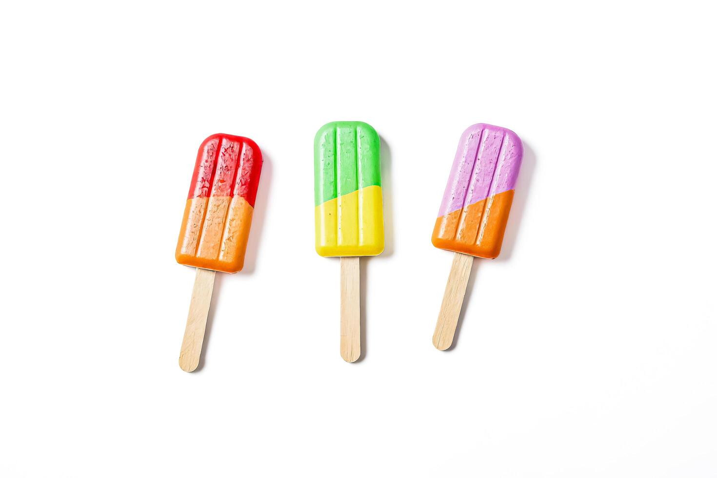 Colorful Popsicles on White Background photo