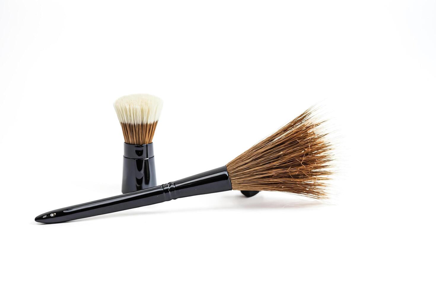Two brushes isolated on white background photo