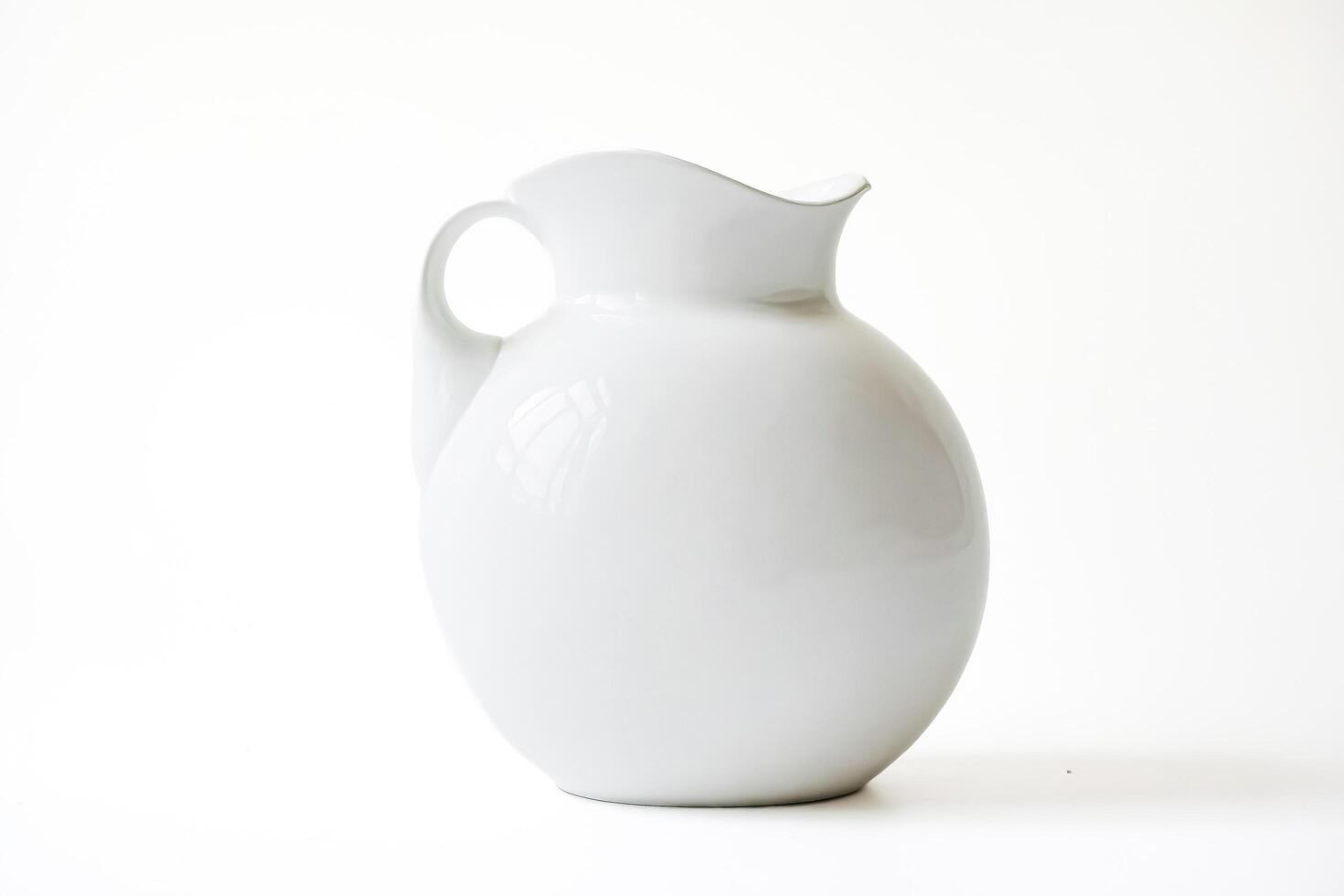 White Ceramic Pitcher photo