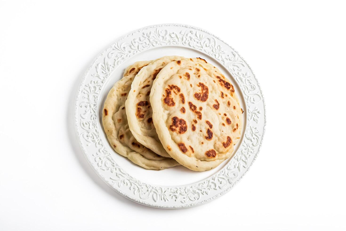 Naan bread on a white plate photo