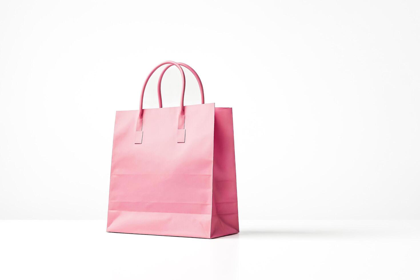 Pink Paper Bag on White Background photo