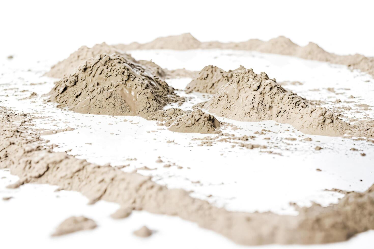 Closeup of Mud Puddles with Small Hills in the Background photo